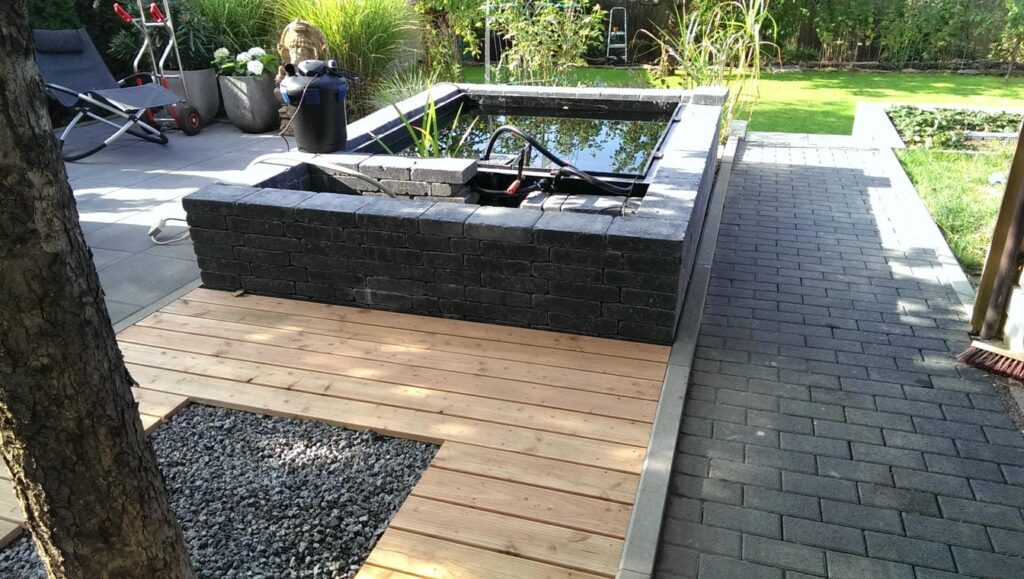 Bau einer Terrasse mit WPC, Whirlpool, Naturstein in Schwetzingen bei Oftersheim